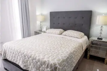Professional carpenter repairing and installing custom wooden beds in Delhi NCR