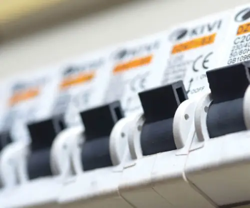 Professional electrician providing electrical panel upgrade and switchboard installation services in Delhi NCR