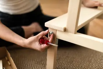 Professional carpenter providing furniture uninstallation services in Delhi NCR