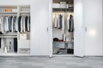 Professional carpenter providing wooden wardrobe repair and installation services in Delhi NCR